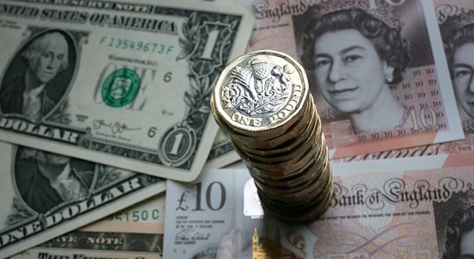 Британското финансово министерство представи вчера монета от 50 пенса отсечена